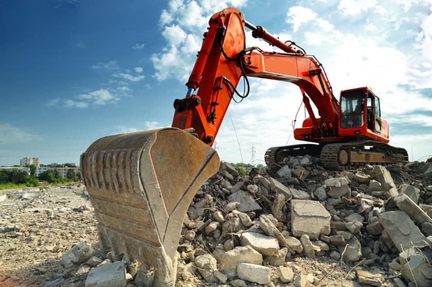 heavy equipment after getting inspection via mobile app on construction site